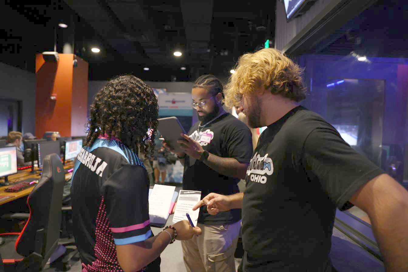 A Senior Esports USA coach working with a player