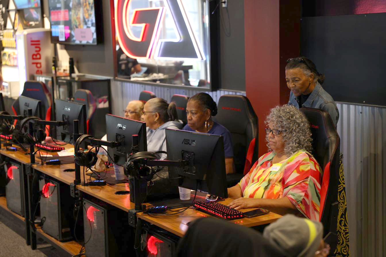 Rows of Senior Esports USA players and coaches during a training session